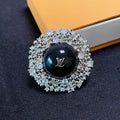 18K Louis Vuitton Black Ball Brooch